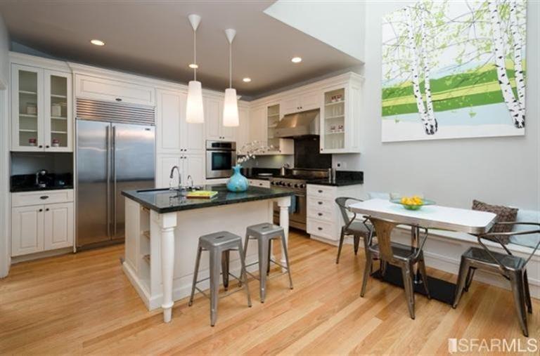 76 Rossi San Francisco, CA 94118 - Photo 6 of 30 Along with the seating area at the island, there is a built-in banquet with room for a table for casual dining.