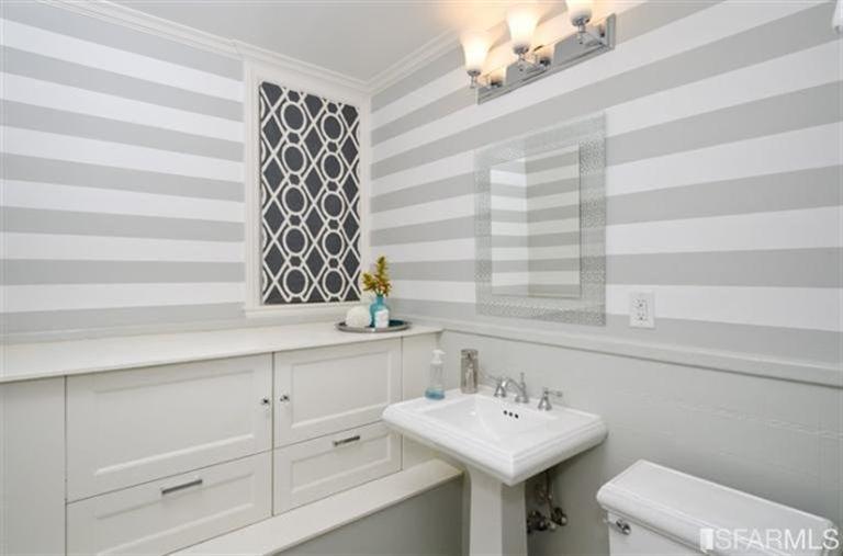 76 Rossi San Francisco, CA 94118 - Photo 8 of 30 A full bath is off the hallway on the main level. The laundry room is located between this bath and the office.