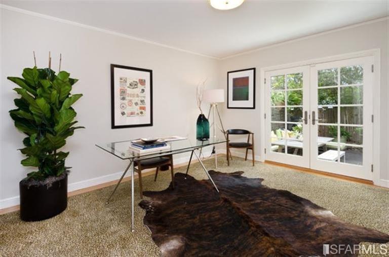 76 Rossi San Francisco, CA 94118 - Photo 9 of 30 The office, located in the rear of the house, has French doors opening to a decked yard.
