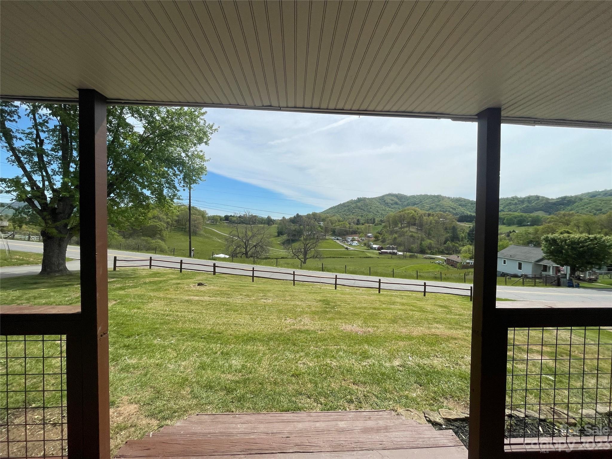 504 Mulberry Street Clyde, NC 28721 - Photo 2 of 18 a view of a city from a window