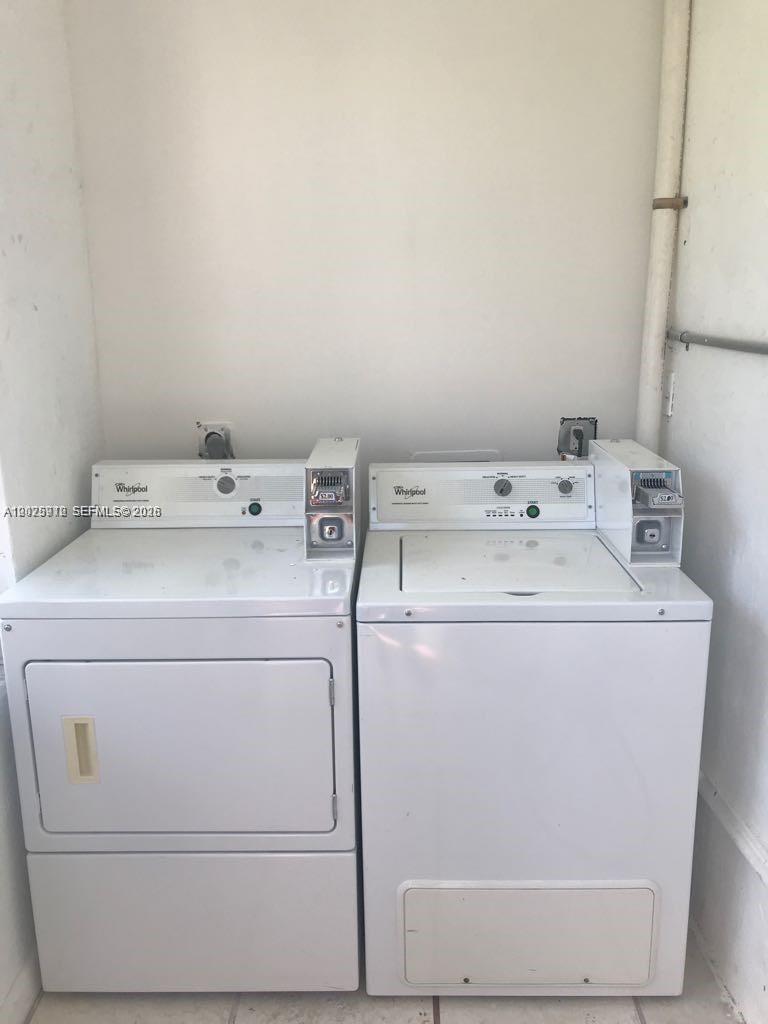 2224 Southwest 11th Street, Unit 3 Miami, FL 33135 - Photo 15 of 15 a utility room with dryer and washer
