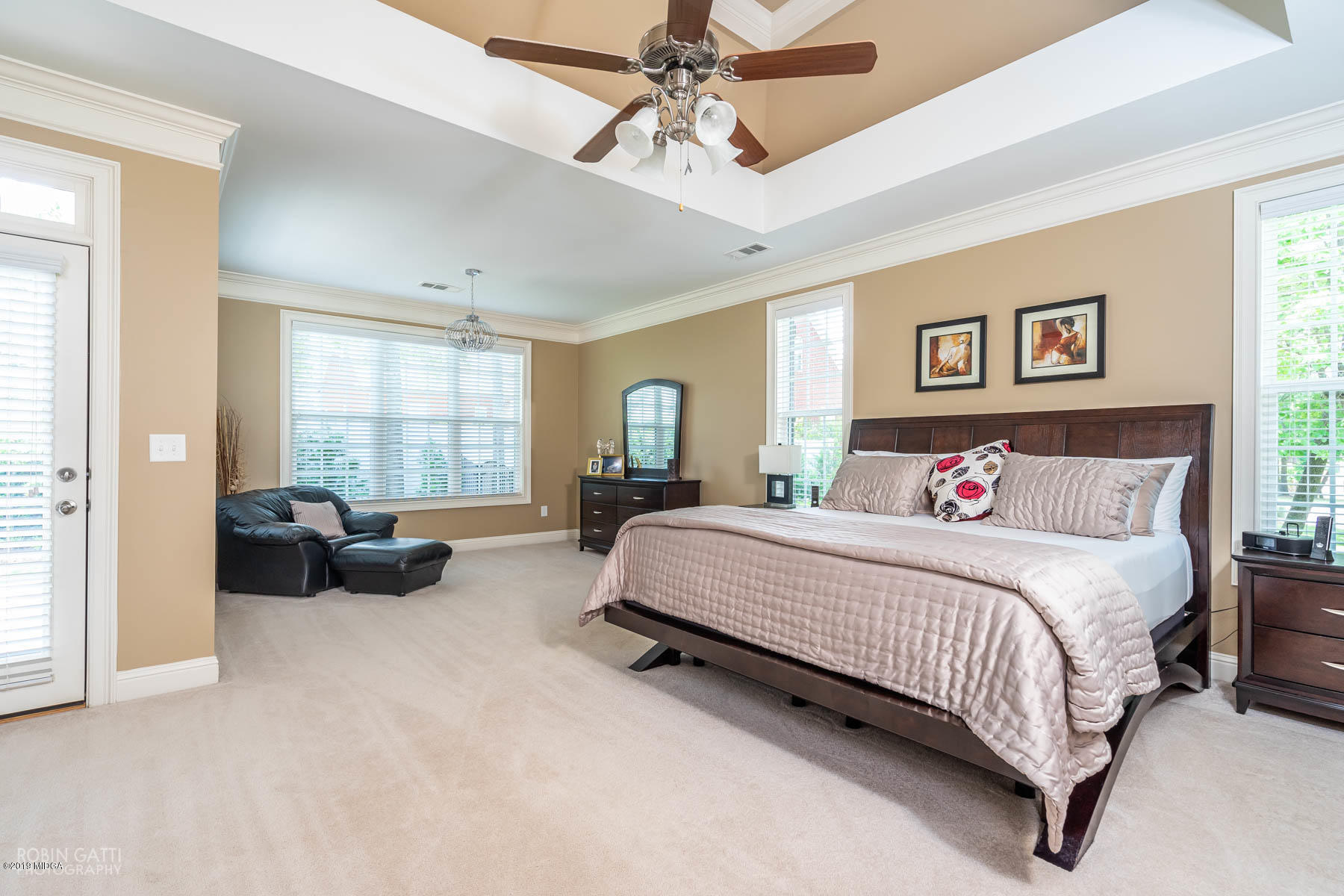 339 Eagle Ridge Road Macon, GA 31216 - Photo 22 of 56 a spacious bedroom with a bed and a couch