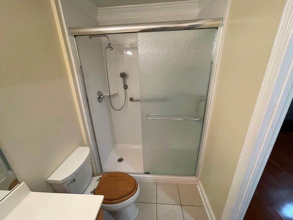 3190 Serenade Court Alpharetta, GA 30004 - Photo 14 of 41 a bathroom with a toilet and a shower