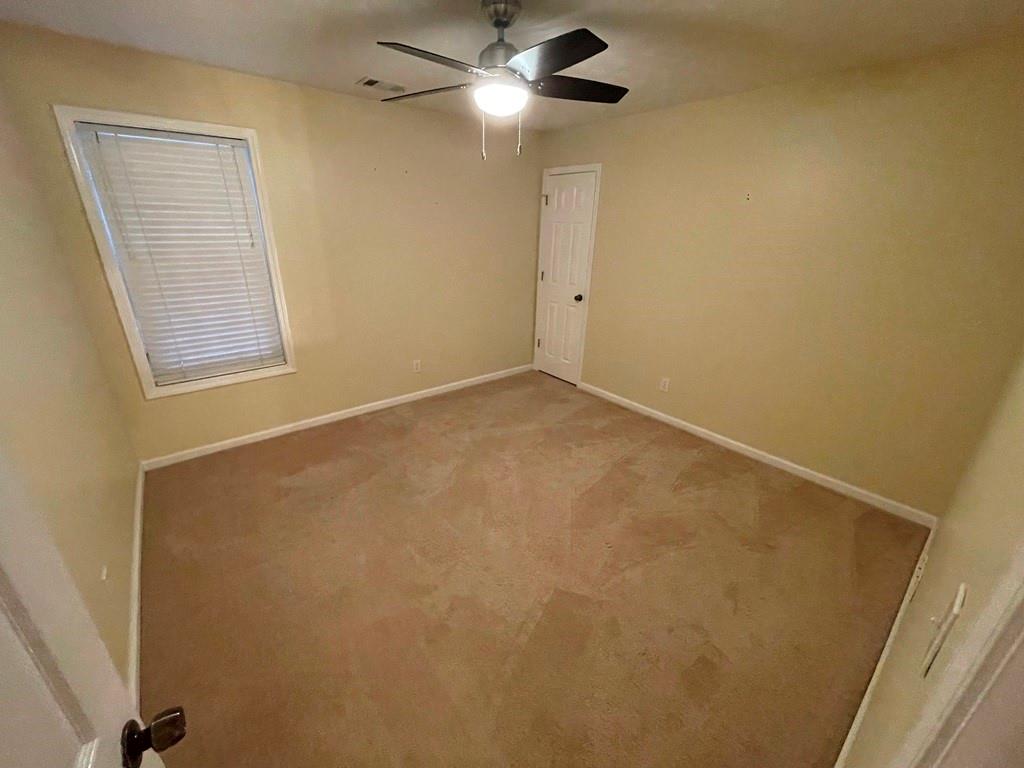 3190 Serenade Court Alpharetta, GA 30004 - Photo 22 of 41 a view of an empty room with a window