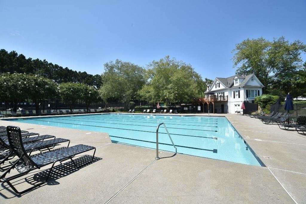 3190 Serenade Court Alpharetta, GA 30004 - Photo 31 of 41 a view of swimming pool with outdoor seating and yard in back