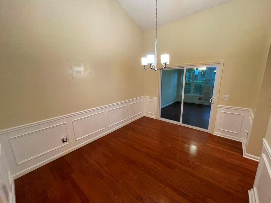 3190 Serenade Court Alpharetta, GA 30004 - Photo 7 of 41 a view of a livingroom with a chandelier