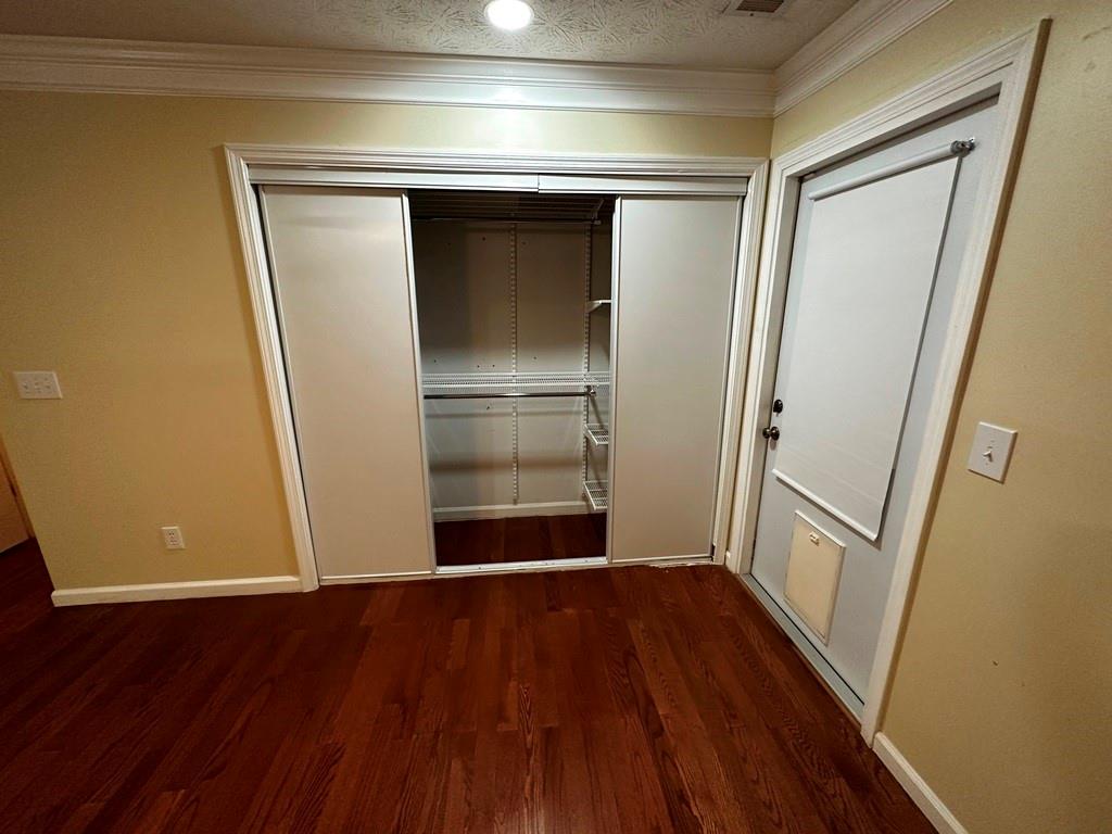 3190 Serenade Court Alpharetta, GA 30004 - Photo 10 of 41 a view of empty room with wooden floor