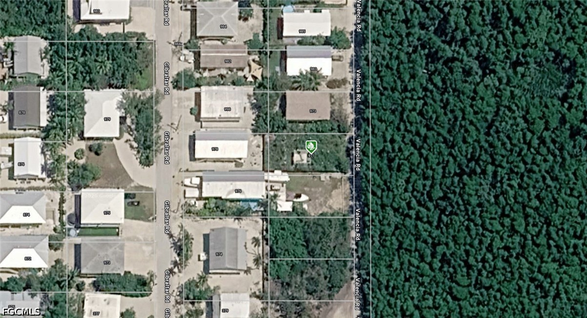 971 Valencia Road Key Largo, FL 33037 - Photo 1 of 3 an aerial view of residential houses with outdoor space