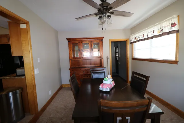 a living room with a sink furniture and a window