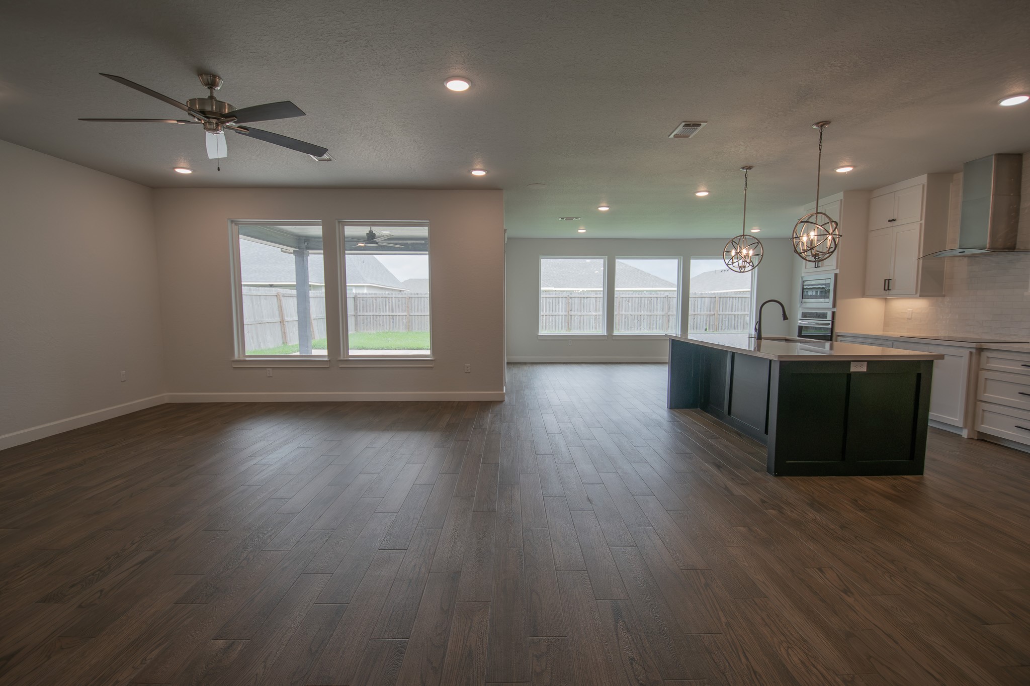 16 Greystone Court Angleton, TX 77515 - Photo 43 of 43 Open Floorplan into Living Room & Kitchen