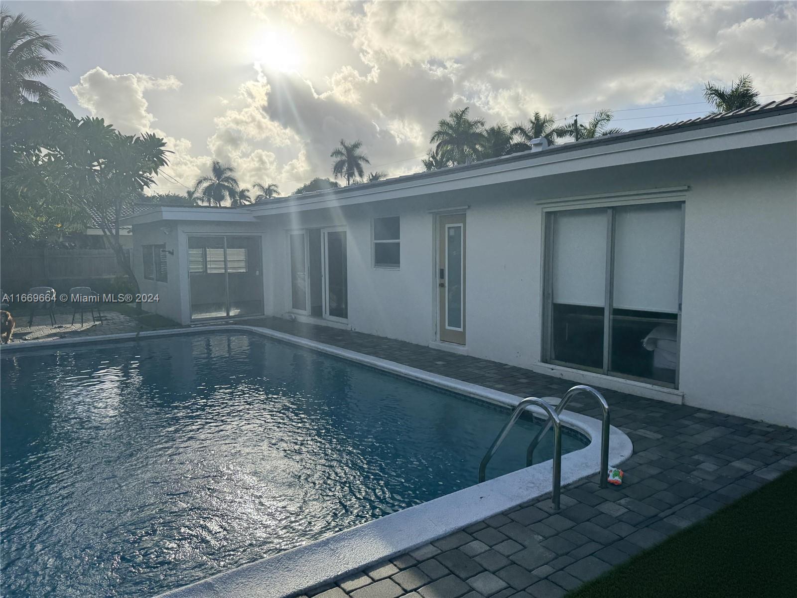 1427 Northeast 60th Street Fort Lauderdale, FL 33334 - Photo 3 of 3 a view of a balcony with an outdoor space
