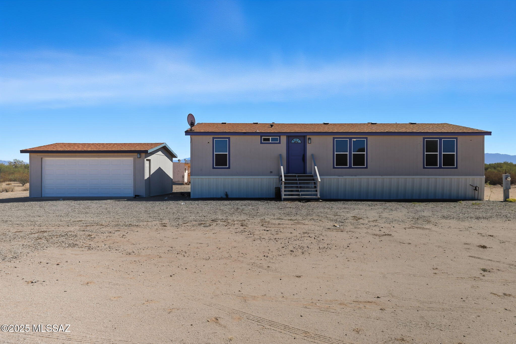 8790 North Trico Road Marana, AZ 85653 - Photo 2 of 35 a house view with a backyard