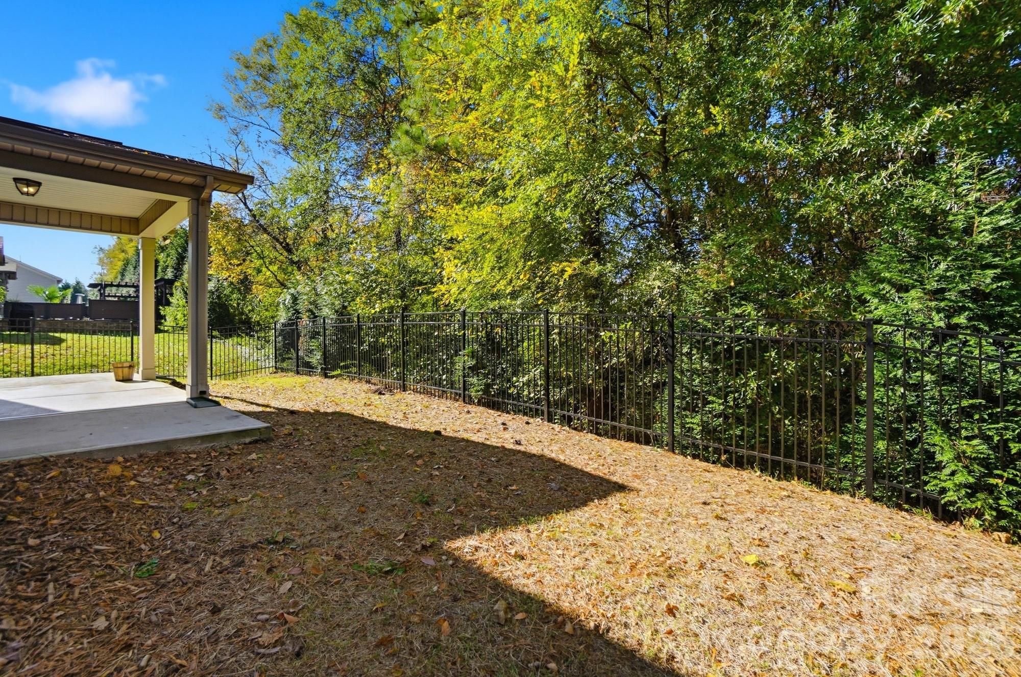 4325 Hunton Dale Road Northwest Concord, NC 28027 - Photo 40 of 42 a view of a backyard with small cabin