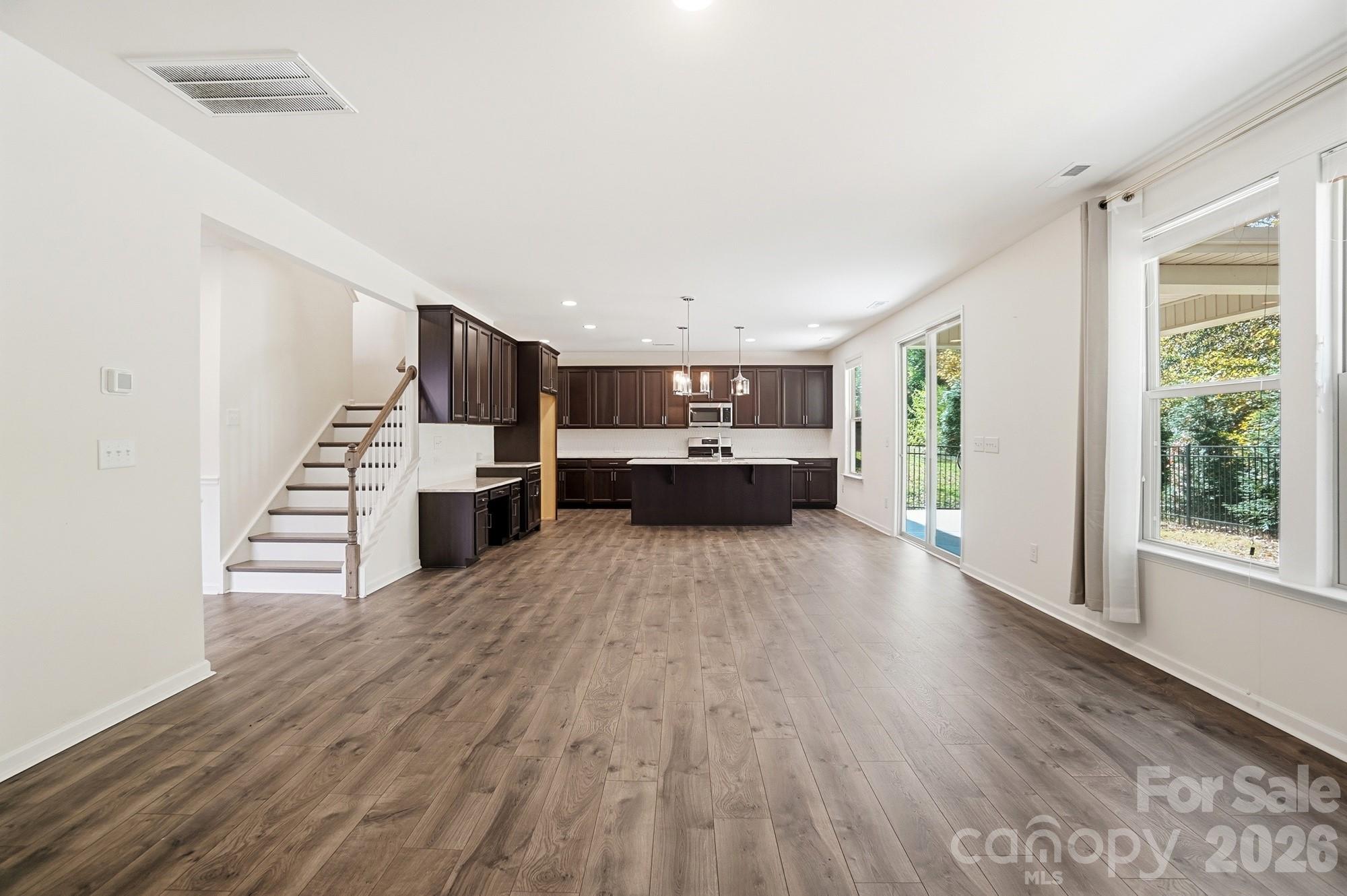4325 Hunton Dale Road Northwest Concord, NC 28027 - Photo 8 of 42 a view of kitchen with furniture and wooden floor