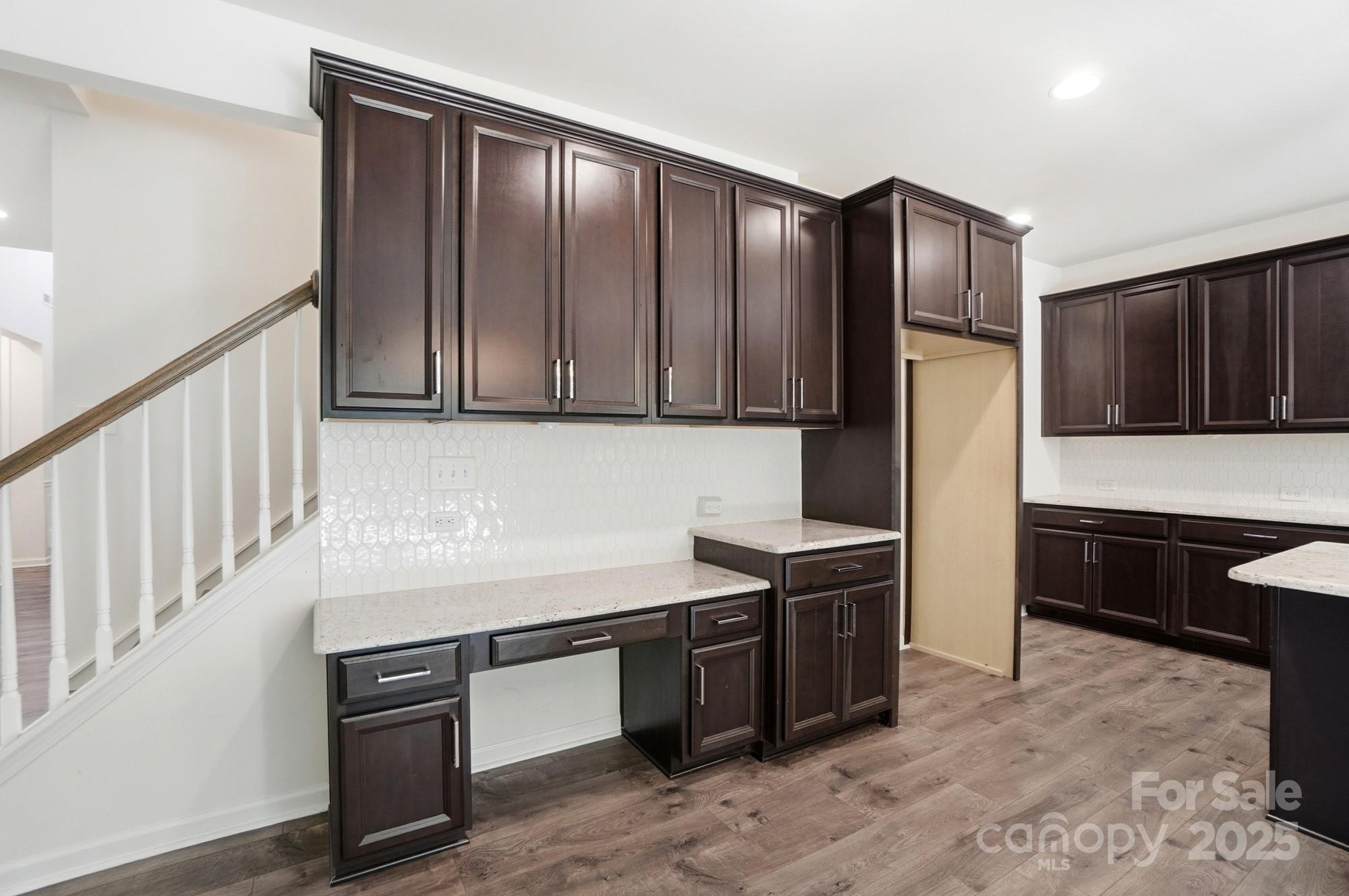 4325 Hunton Dale Road Northwest Concord, NC 28027 - Photo 9 of 42 a kitchen with stainless steel appliances granite countertop a refrigerator and a stove top oven