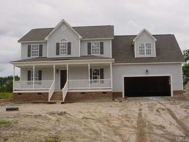 138 Cross Ridge Drive Willow Spring, NC 27592 - Photo 1 of 1 front view of a house with a yard
