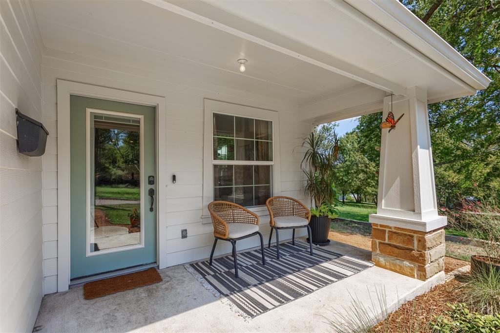 1211 Garcia Street McKinney, TX 75069 - Photo 2 of 27 a outdoor space with a couch and chairs