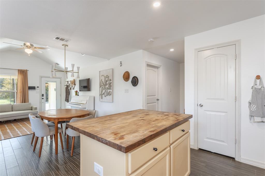 1211 Garcia Street McKinney, TX 75069 - Photo 10 of 27 a kitchen with a table and chairs