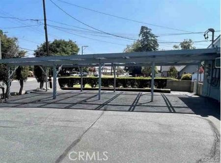 7004 Amethyst Avenue, Unit 2 Rancho Cucamonga, CA 91701 - Photo 3 of 6 a view of a chairs and tables in the patio