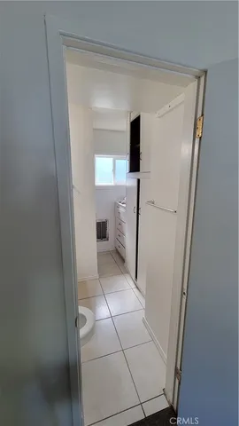 a view of hallway with washer and dryer