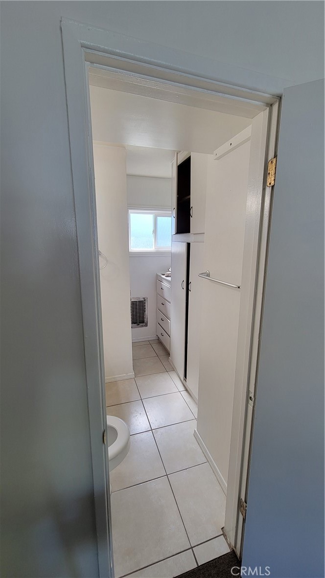 7004 Amethyst Avenue, Unit 2 Rancho Cucamonga, CA 91701 - Photo 6 of 6 a view of hallway with washer and dryer
