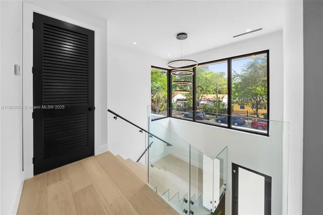 a bathroom with a toilet a sink and shower