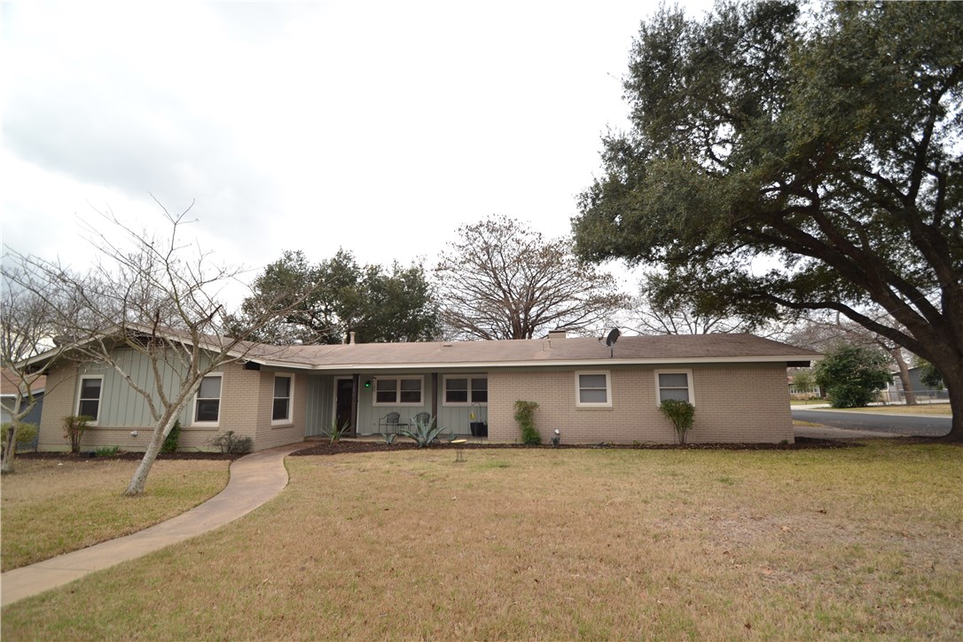 1802 Hutto Road Georgetown, TX 78626 - Photo 1 of 1 a front view of a house with a garden