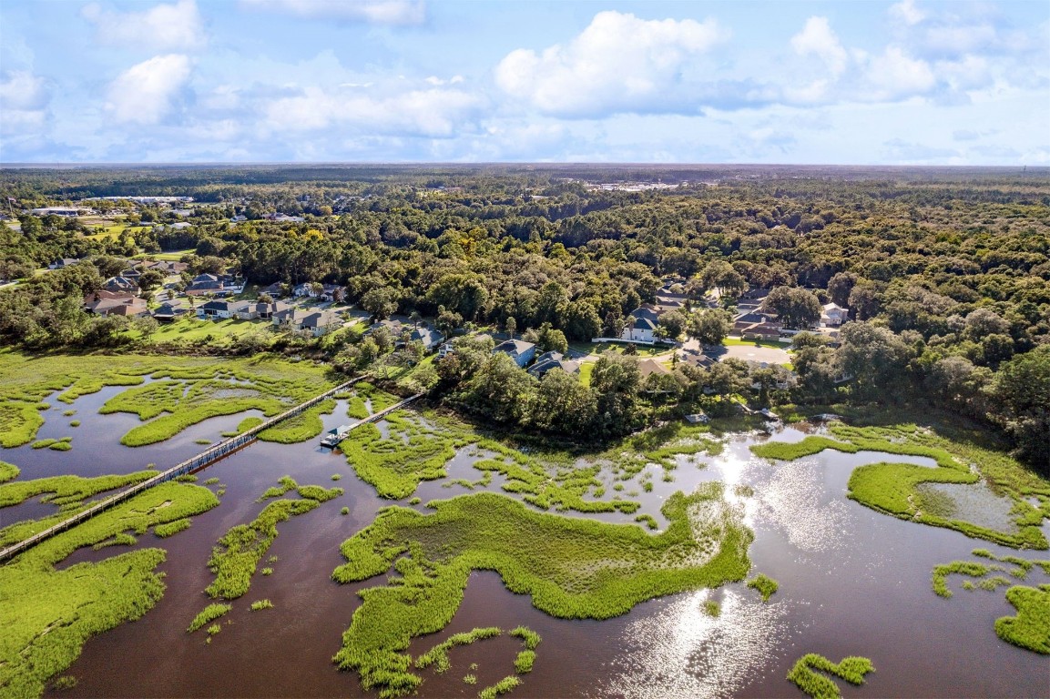 96282 Windsor Drive Yulee, FL 32097 - Photo 14 of 35 an aerial view of residential houses with outdoor space