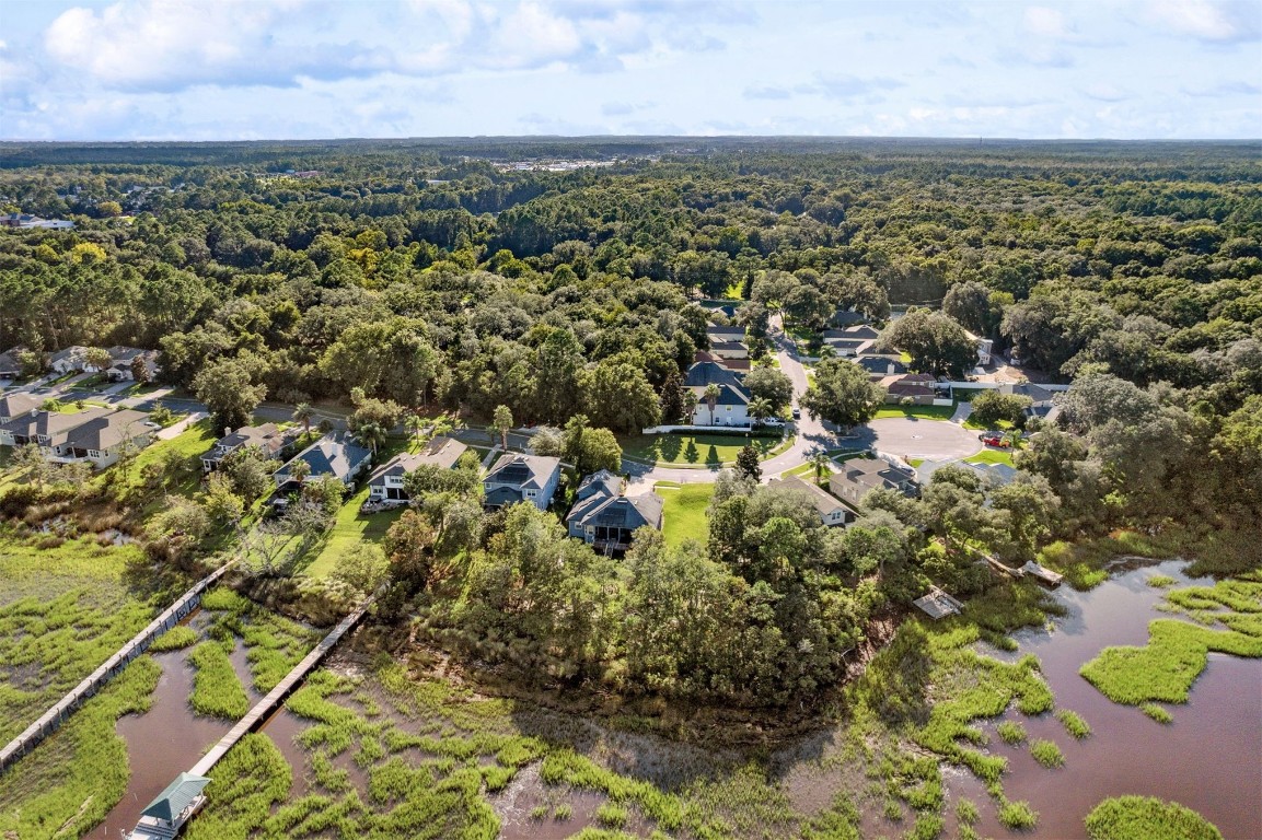 96282 Windsor Drive Yulee, FL 32097 - Photo 16 of 35 an aerial view of residential houses with outdoor space