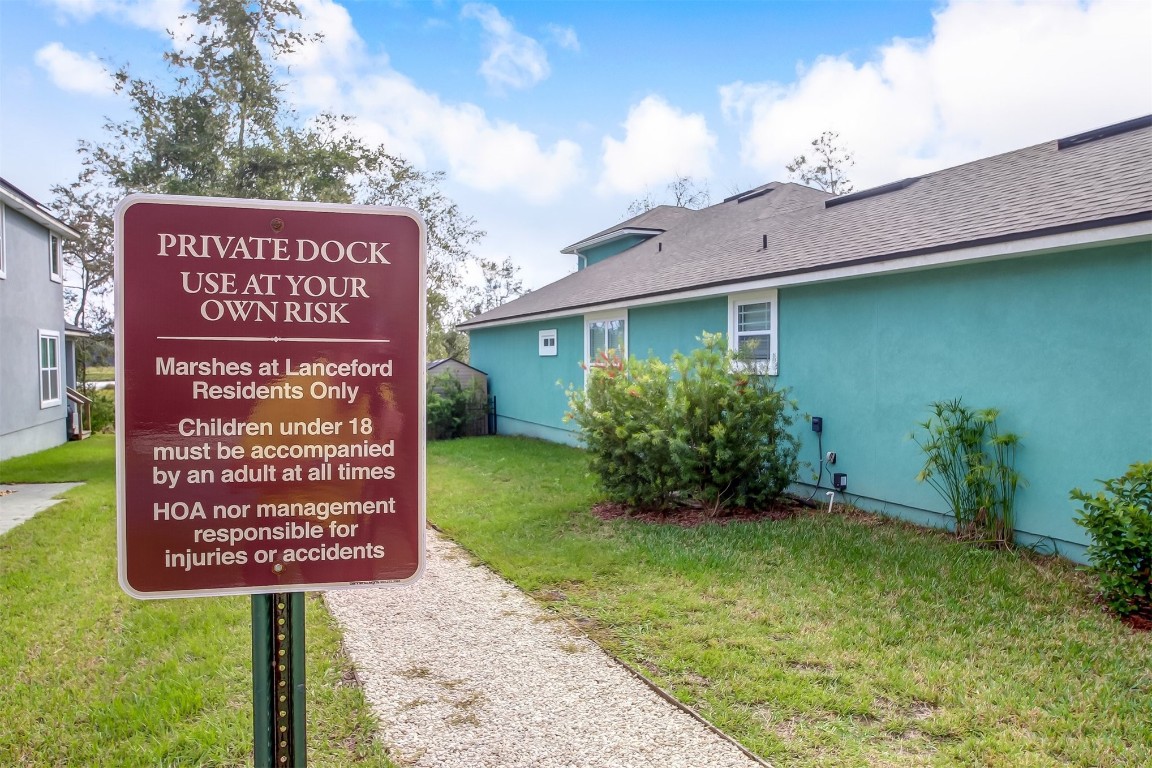 96282 Windsor Drive Yulee, FL 32097 - Photo 23 of 35 a sign on the side of a building