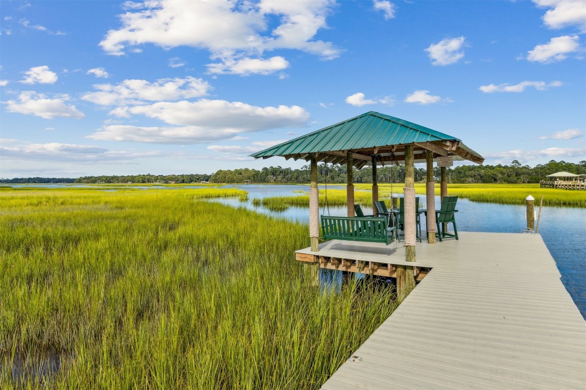 96282 Windsor Drive Yulee, FL 32097 - Photo 26 of 35 a view of a swimming pool with an ocean from a balcony