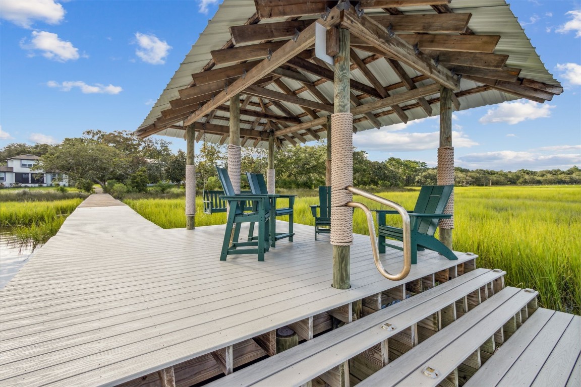 96282 Windsor Drive Yulee, FL 32097 - Photo 29 of 35 a view of a swimming pool with a patio