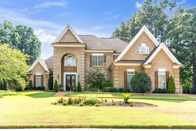 a view of a house with a swimming pool