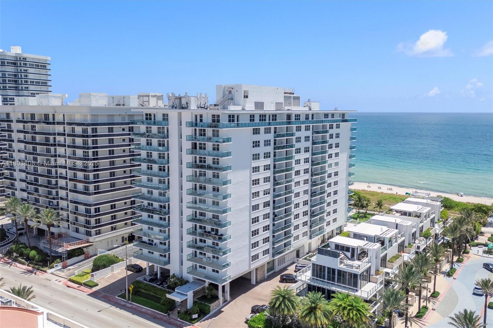 9511 Collins Avenue, Unit 1002 Surfside, FL 33154 - Photo 2 of 27 a city view with tall buildings