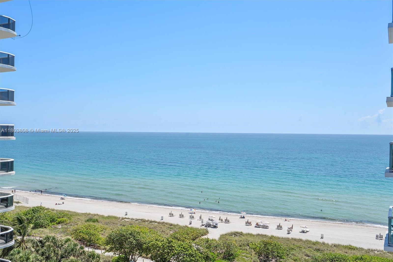 9511 Collins Avenue, Unit 1002 Surfside, FL 33154 - Photo 3 of 27 a view of an ocean beach