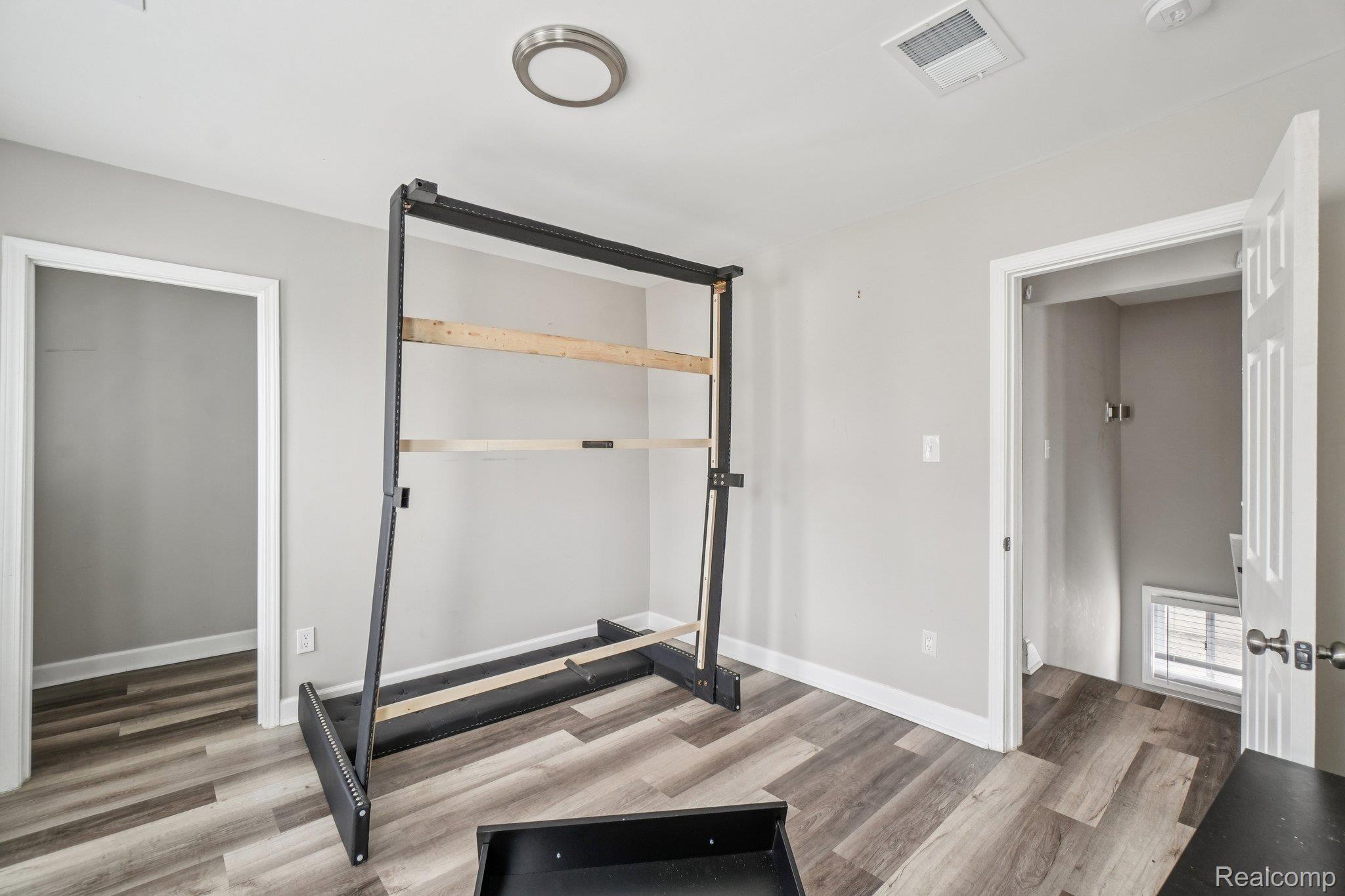 3822 Wabash Street Detroit, MI 48208 - Photo 17 of 17 Exercise room with light wood-style flooring and baseboards