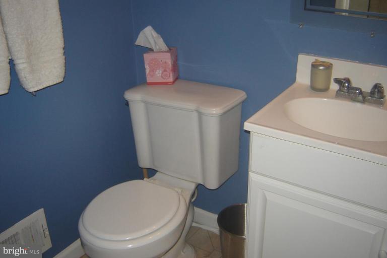 17563 Kohlhoss Road Poolesville, MD 20837 - Photo 18 of 20 a bathroom with a toilet and a sink