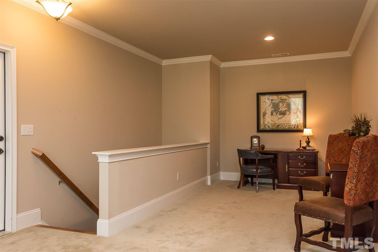3929 Colinwood Lane Raleigh, NC 27606 - Photo 17 of 24 a view of a livingroom with furniture and furniture