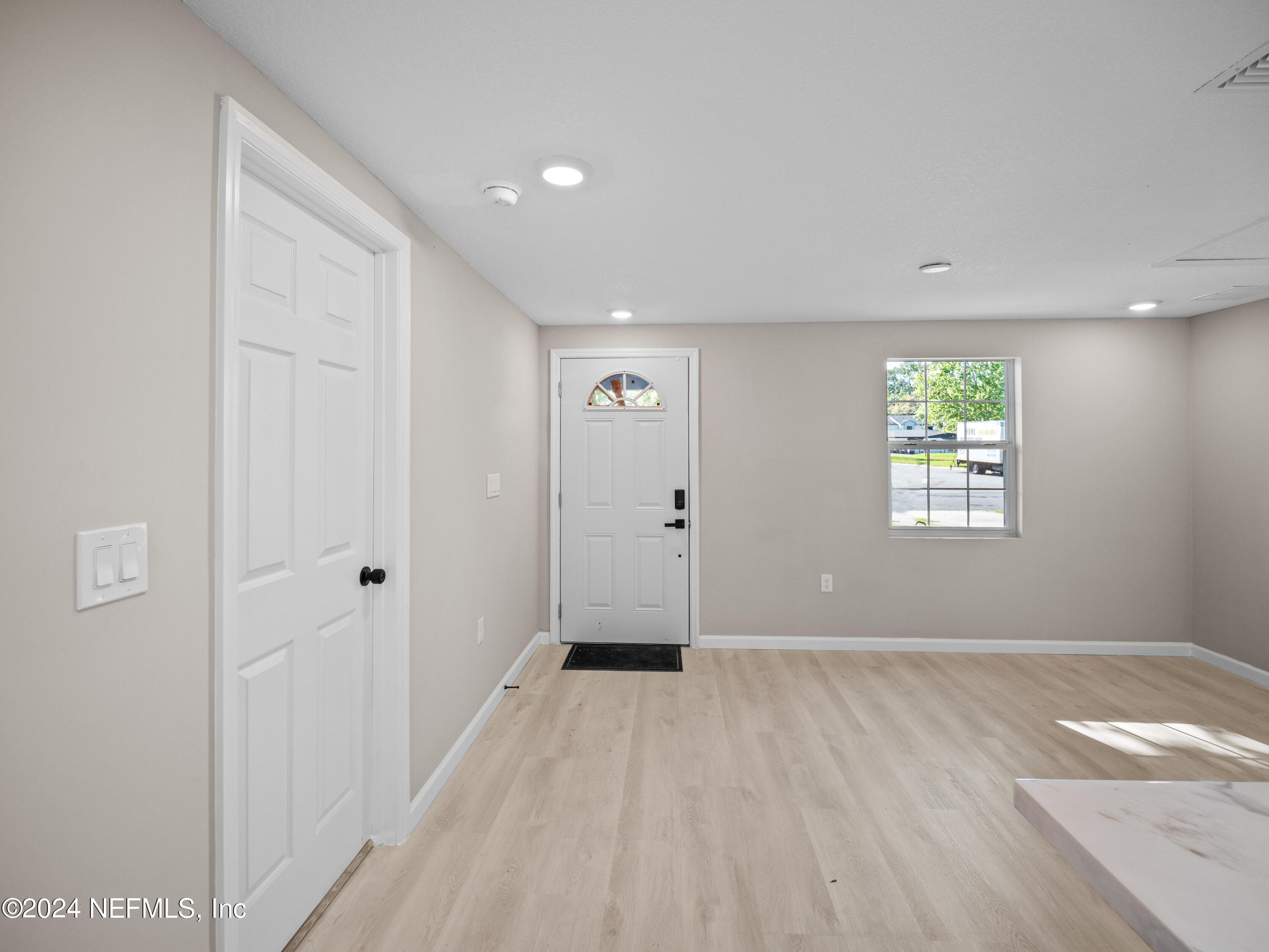 5609 Tampico Road Jacksonville, FL 32244 - Photo 5 of 29 Living Room & Main Door