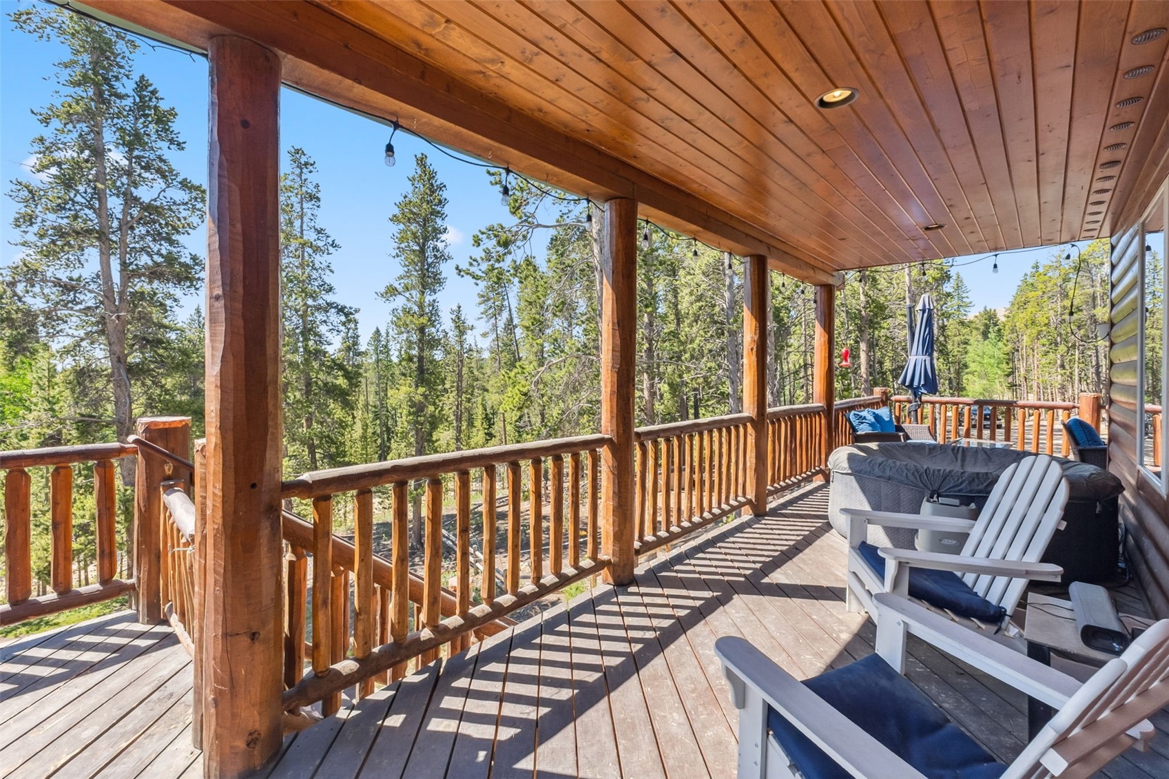 889 Venture Road Fairplay, CO 80440 - Photo 27 of 38 a view of balcony with couch and chairs