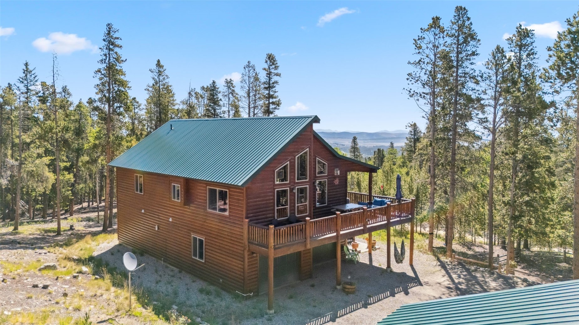 889 Venture Road Fairplay, CO 80440 - Photo 33 of 38 a view of a house with a yard from a balcony