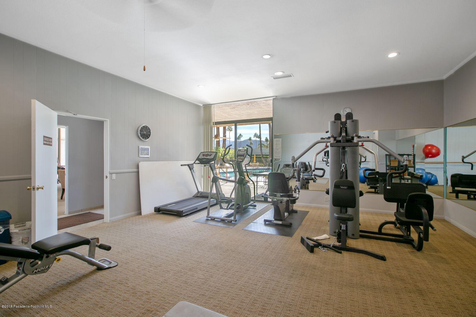 1111 East Ramon Road, Unit 85 Palm Springs, CA 92264 - Photo 22 of 29 a view of a room with gym equipment