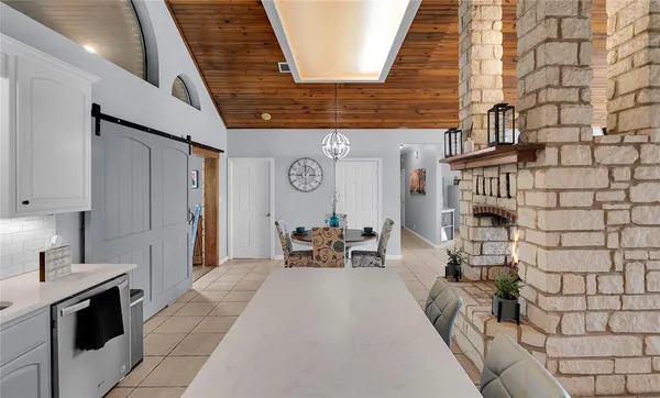 a dining room with furniture