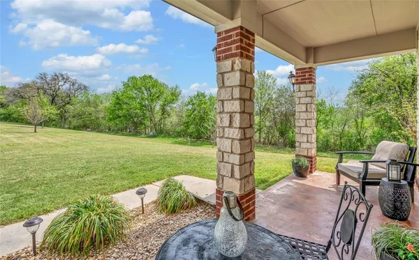 a view of yard from outdoor seating