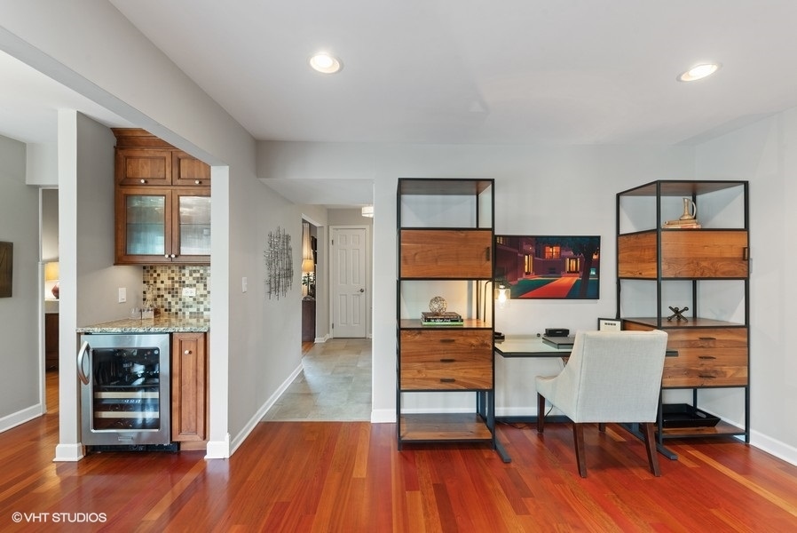 7 Knoll Ridge Road Rolling Meadows, IL 60008 - Photo 11 of 37 a dining room with furniture and wooden floor