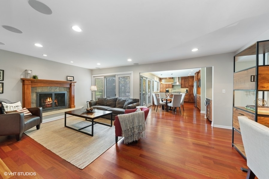 7 Knoll Ridge Road Rolling Meadows, IL 60008 - Photo 12 of 37 a living room with fireplace furniture and a wooden floor