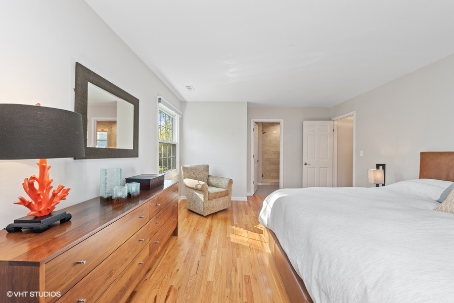 7 Knoll Ridge Road Rolling Meadows, IL 60008 - Photo 17 of 37 a bed room with a bed and a couch