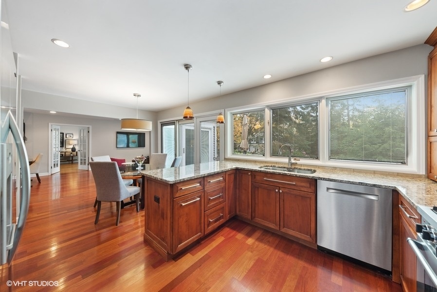 7 Knoll Ridge Road Rolling Meadows, IL 60008 - Photo 8 of 37 a large kitchen with lots of counter space and a sink