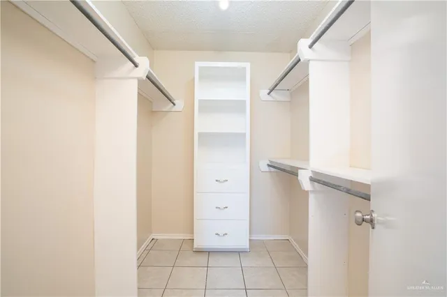 a view of a backyard with grass