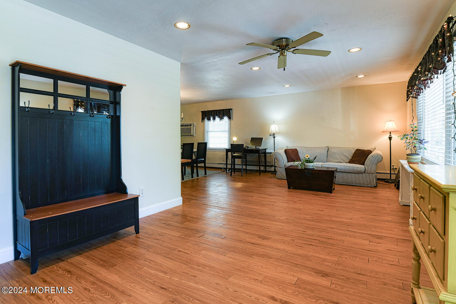 111 Cookman Avenue Ocean Grove, NJ 07756 - Photo 8 of 8 a living room with furniture and a wooden floor